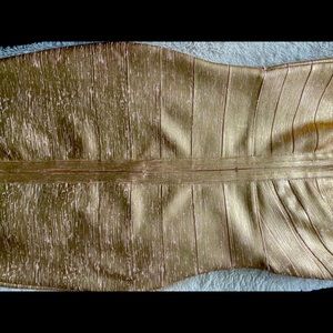 Gold bandage dress. Gives a beautiful silhouette and enhance your curves!